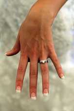 Woman's hand with diamond ring